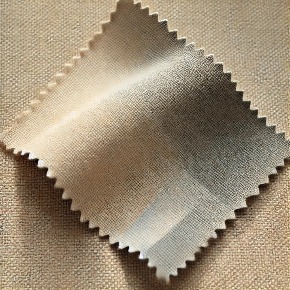 DALL·E 2024-08-23 17.33.29 - A swatch of fabric in the color greige, a blend of gray and beige, that has a soft, muted tone. The color should be a neutral, warm gray with hints of.jpg